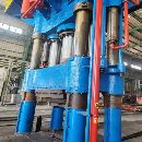 []新定1600吨锻造油压机加15吨360度旋转操作机，